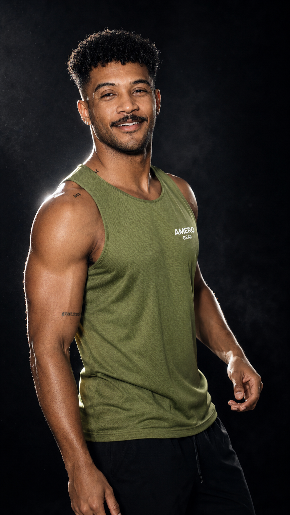 Man wearing a green tank top with a brand logo on a black background