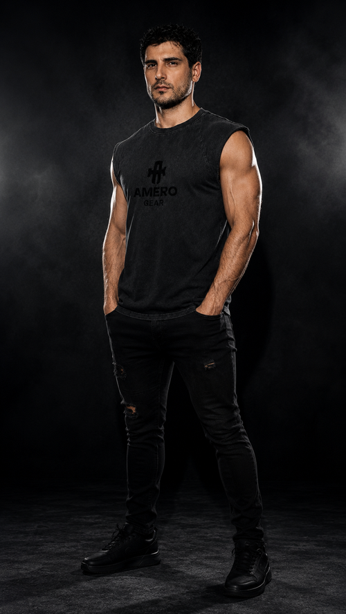 Man wearing a black sleeveless shirt with a logo on a dark background