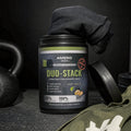 Amero Gear Duo-Stack supplement container with fitness equipment in the background